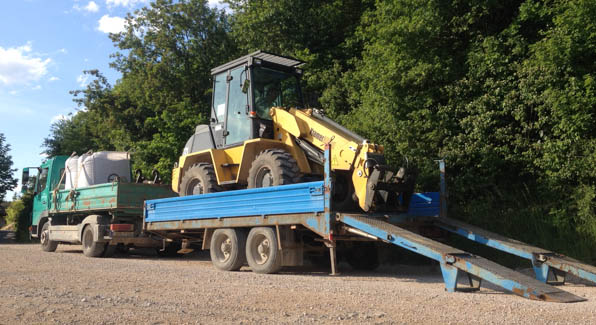 Wilfried Grawunder - Fuhrpark, Radlader und LKW mit Tieflader